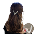 Silver metallic v-shaped hair clip with intricate leaf detailing from the crystal v shape hair clip set