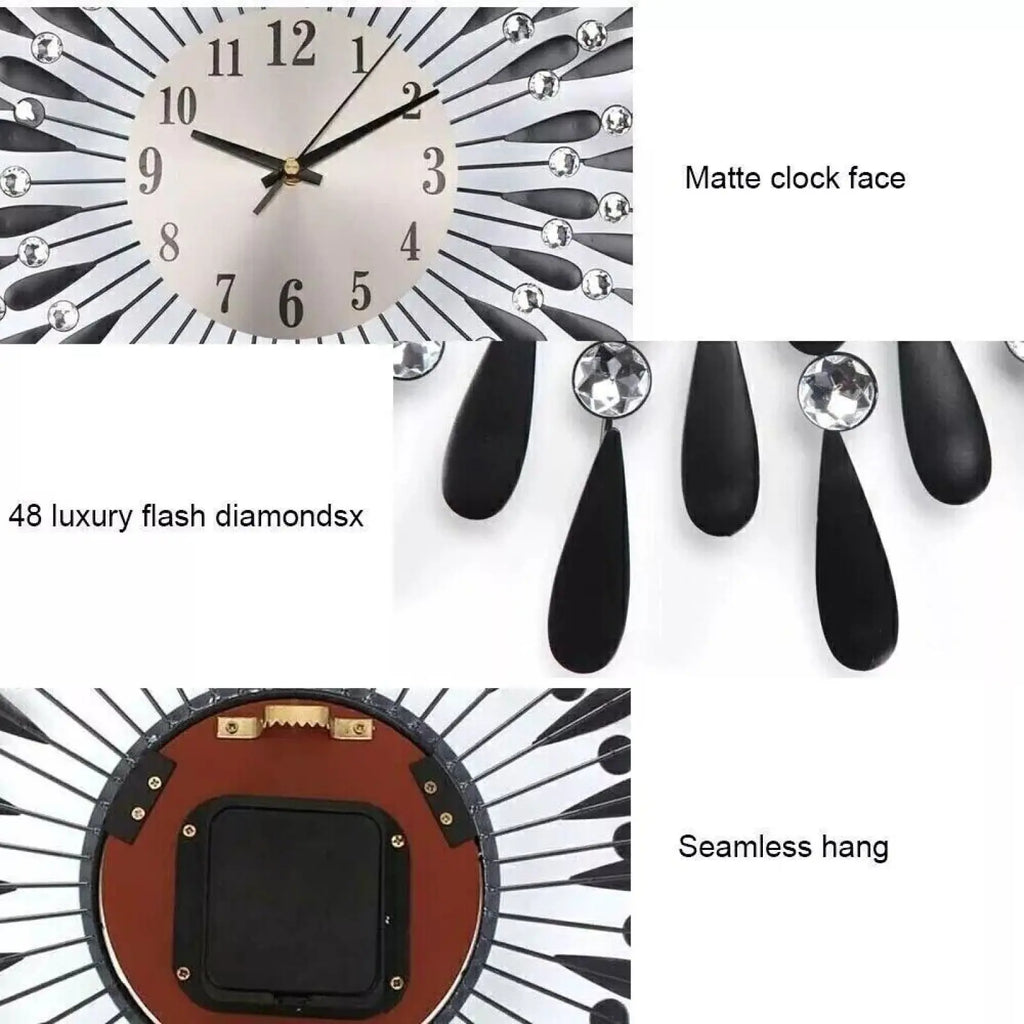 A sleek modern crystal wall clock with a matte silver face and black teardrop arms with flash diamonds