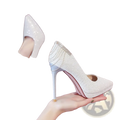 Shiny white platform bridal heels with sparkling rhinestone detailing on the heel and toe for weddings
