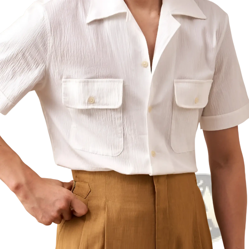 White textured short sleeve button up shirt for men with two front pockets and a navy Cuban collar design