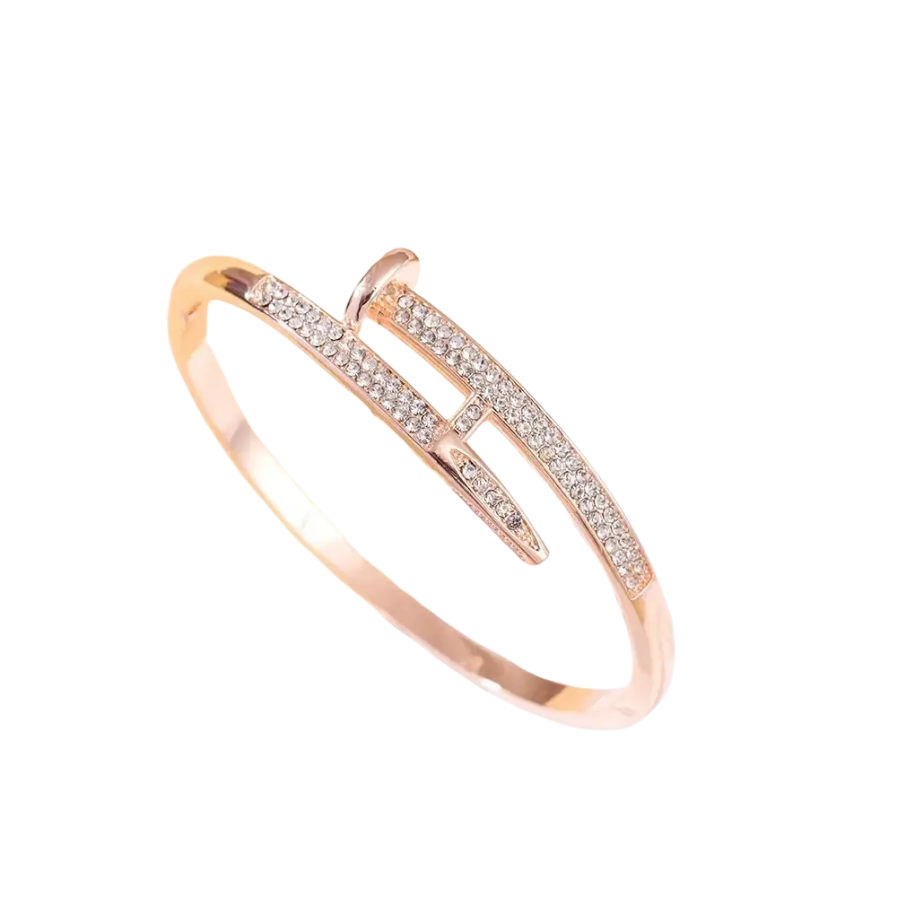 Rose gold-toned cubic zirconia intersecting bangle bracelet with sleek modern design and sparkling clear crystals