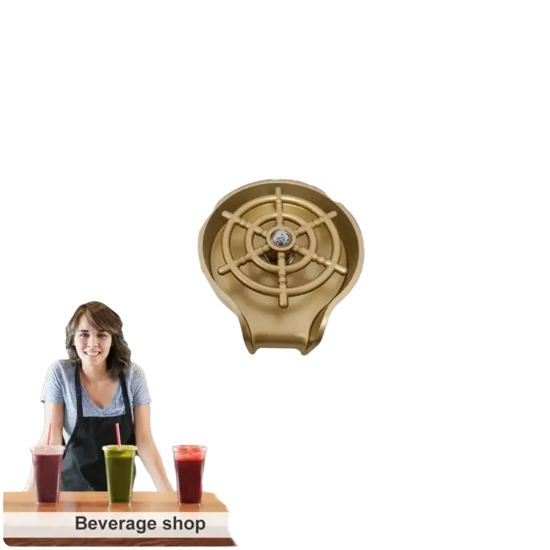 Gold-colored ship wheel-shaped kitchen sink drain cover with central metallic knob for high pressure automatic cup washer