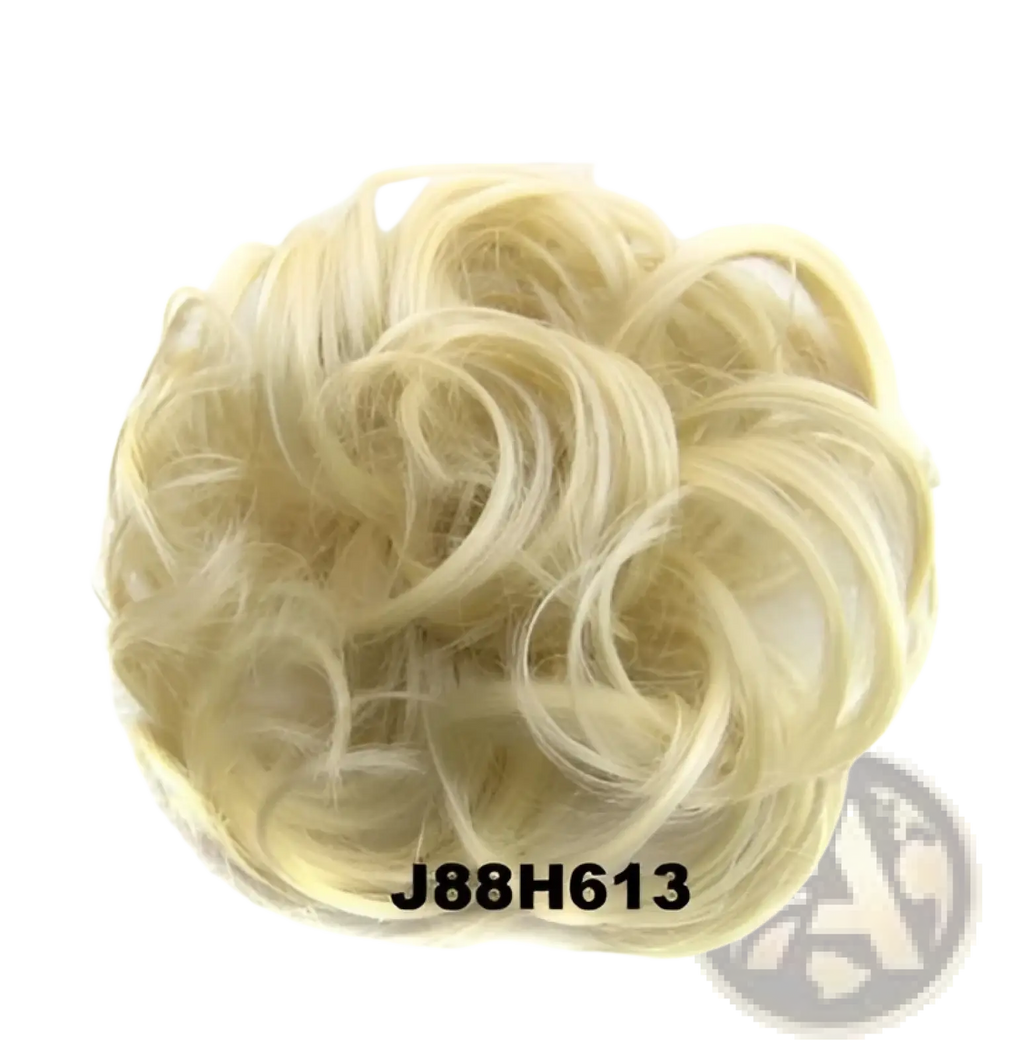 Blonde curly synthetic hair bun extension with soft voluminous texture and natural looking curls
