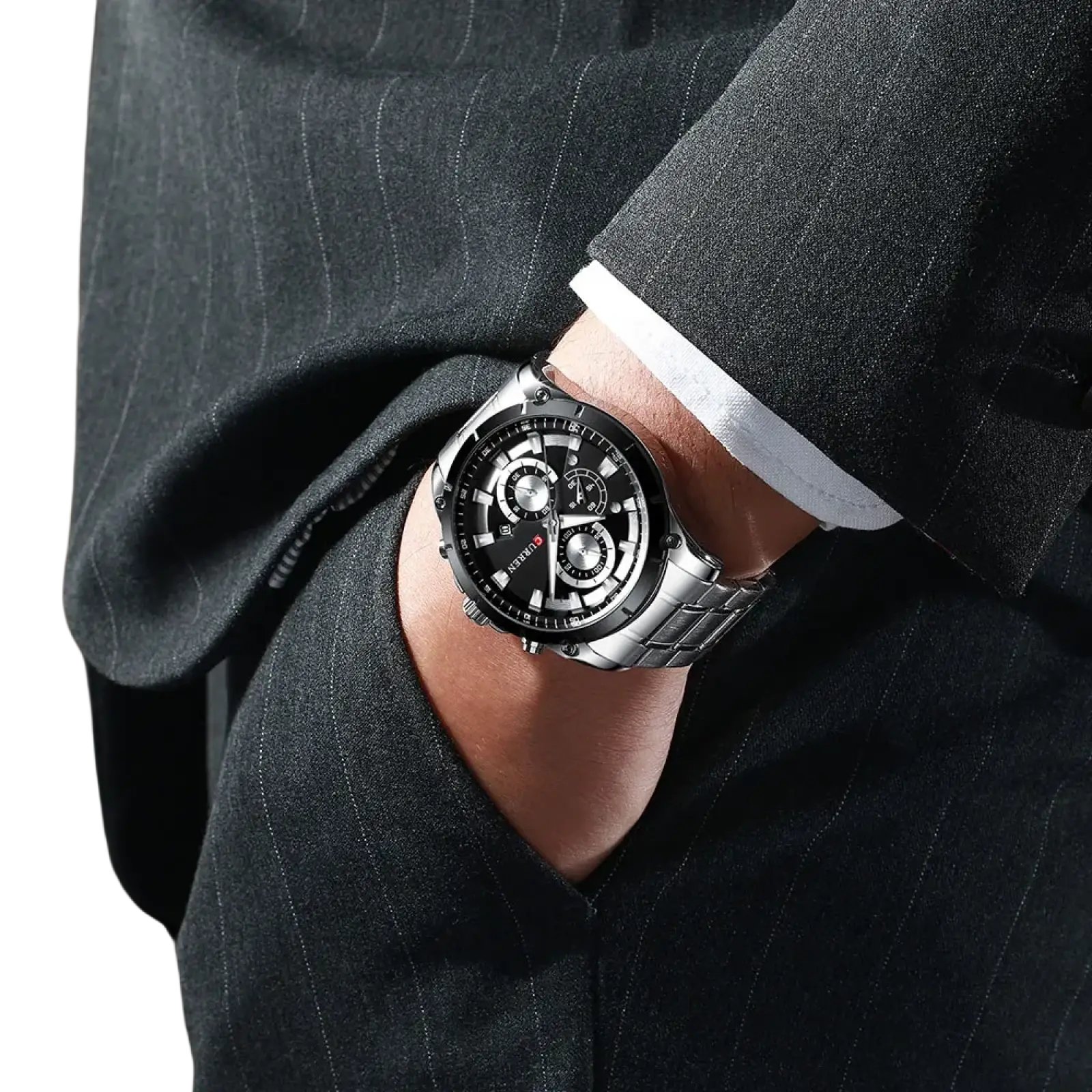 Silver-toned Curren gold chronograph watch with black dial and multiple subdials in stainless steel worn on a man’s wrist