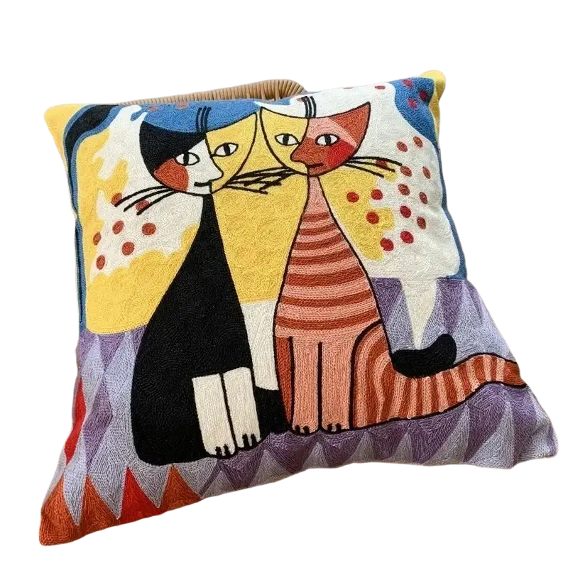 Vibrant embroidered cushion cover 45x45cm featuring black-and-white and orange-striped cats on geometric background