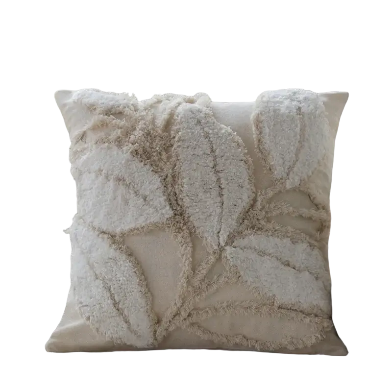 Cream-colored cushion cover 45x45cm with textured fringed leaf appliqués in woven fabric for living room use