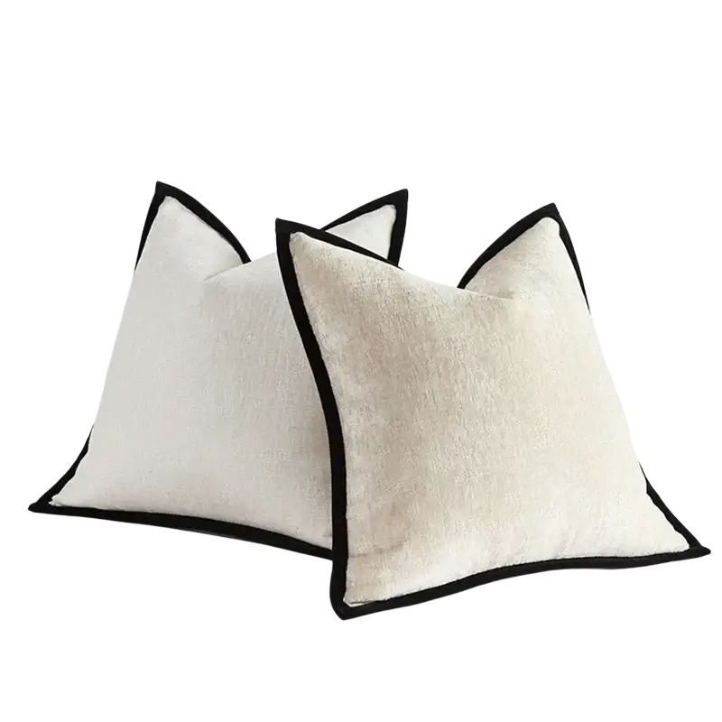 Cream-colored solid color chenille cushion cover with thick fabric and crisp black piping pillow cover edges