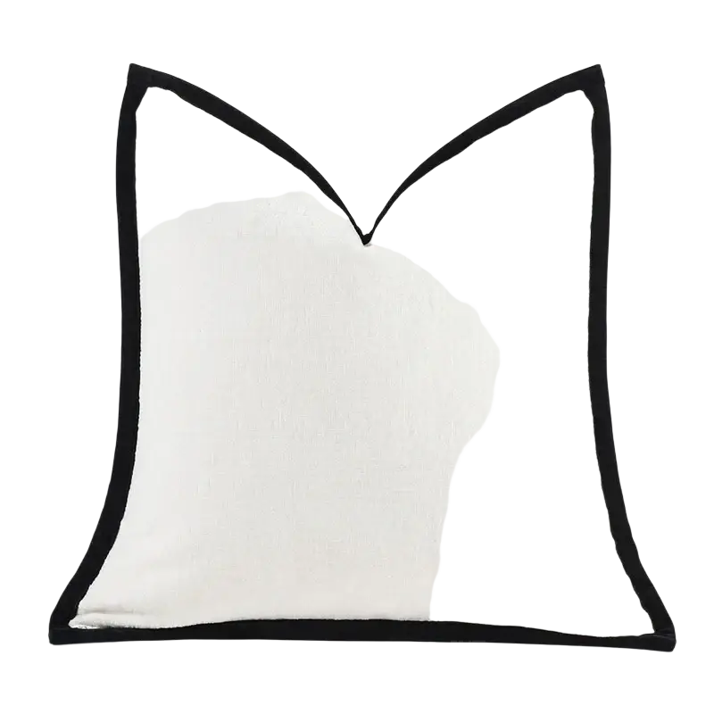 A solid color cushion cover in crisp white linen with bold black piping trim for a thick chenille pillow case