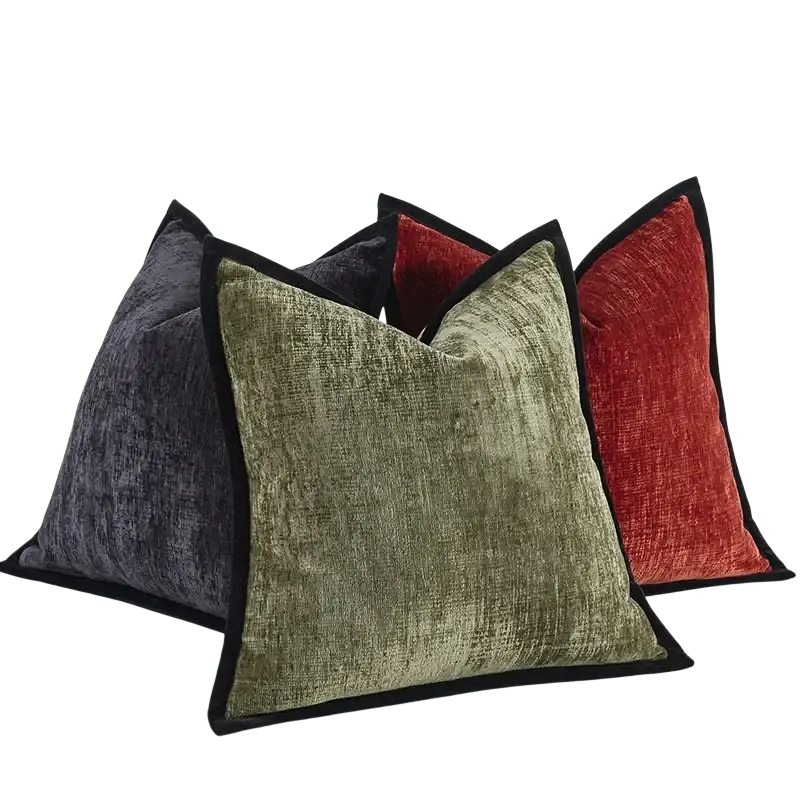 Set of three solid color velvet cushion covers in olive green charcoal gray and rust red with black trim pillow cover