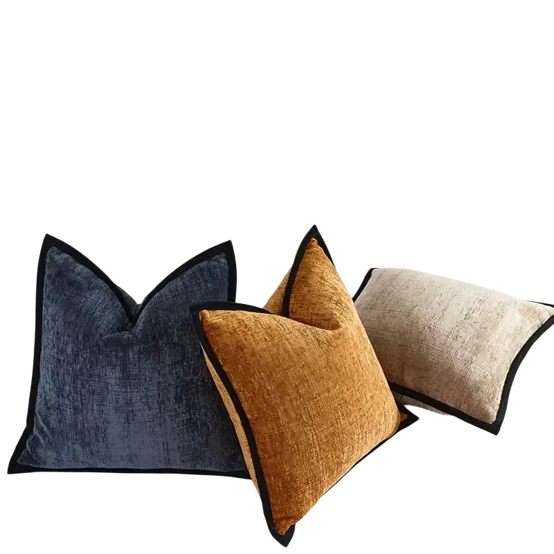 Three rectangular cushion covers in solid navy blue mustard yellow and beige chenille with black velvet trim pillow cover