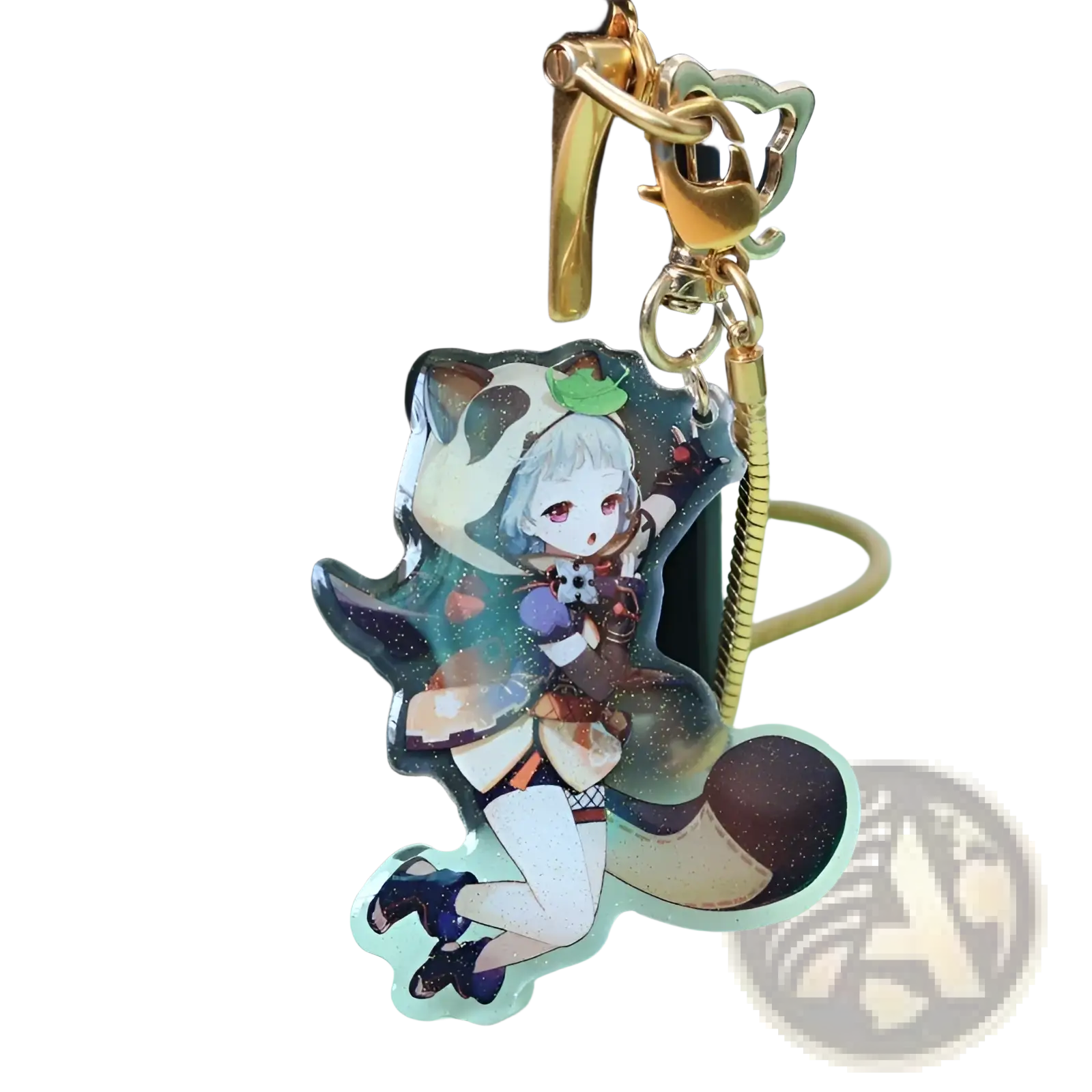 Clear acrylic custom anime photo keychain with silver hair character, green leaf, brown tail, and gold metal clasp