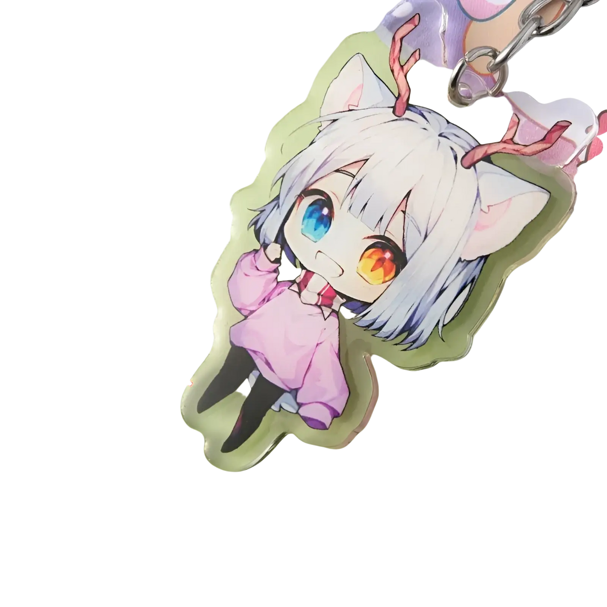 Clear epoxy keychain featuring white haired chibi anime character with blue and orange eyes and red antlers