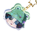 Custom acrylic anime photo keychain with green holographic star design and cartoon character charm with gold chain