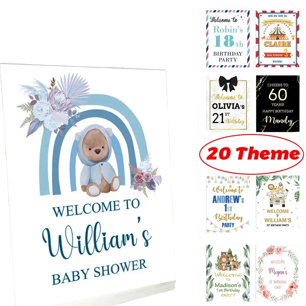 A charming white custom baby shower welcome sign with a soft blue teddy bear and pastel rainbow floral accents