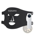 Black elegana facial mask with white cutouts and sleek white remote control for custom beauty treatment