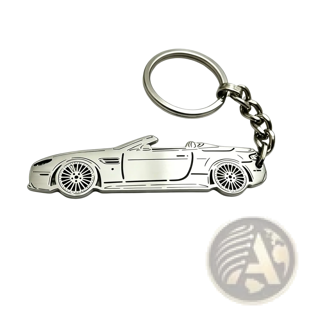 Silver metallic custom car model keychain shaped like a convertible sports car with detailed wheels and body lines
