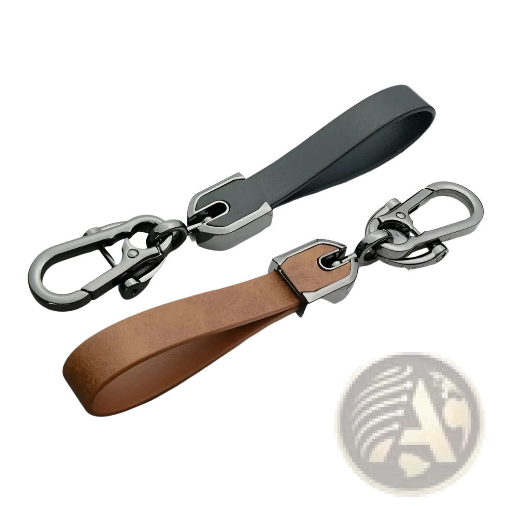 Custom engraved leather keychain in black and tan with silver-toned metal hardware for personalized car key ring
