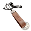 Custom engraved brown leather keychain with silver-toned metal top and personalized signature design gift