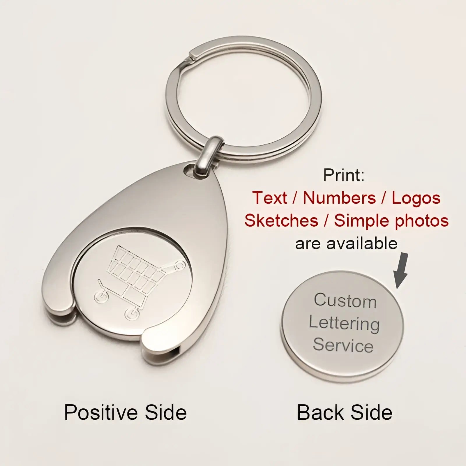 Silver metallic custom engraved metal keychain with teardrop pendant featuring a shopping cart and customizable back