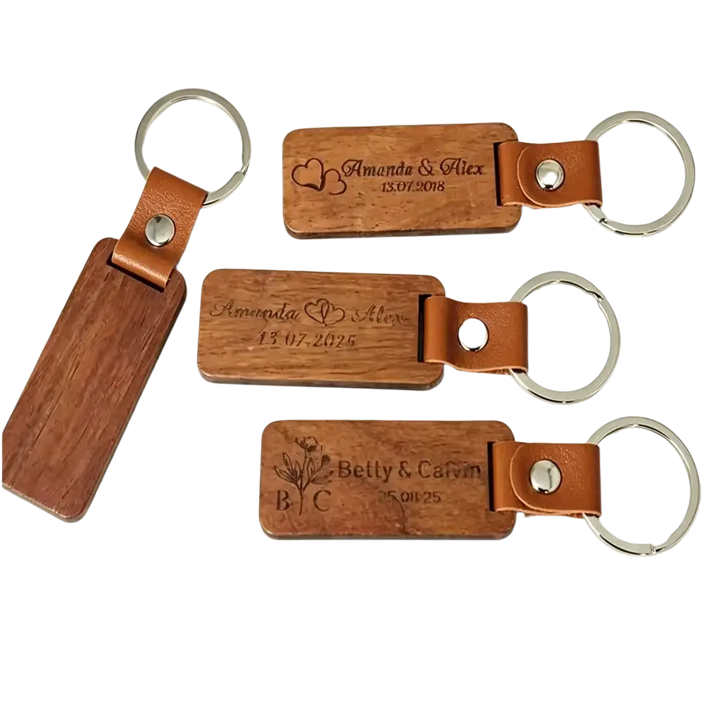 Custom engraved wooden leather keychains with brown wood, tan leather straps, silver rings, personalized with names and dates