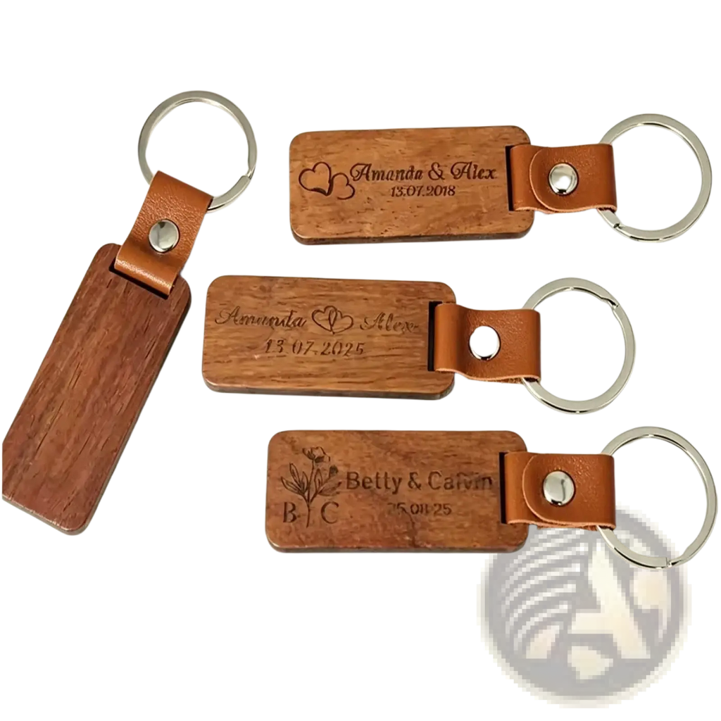 Custom engraved wooden leather keychains with brown wood, tan leather straps, silver rings, personalized with names and dates