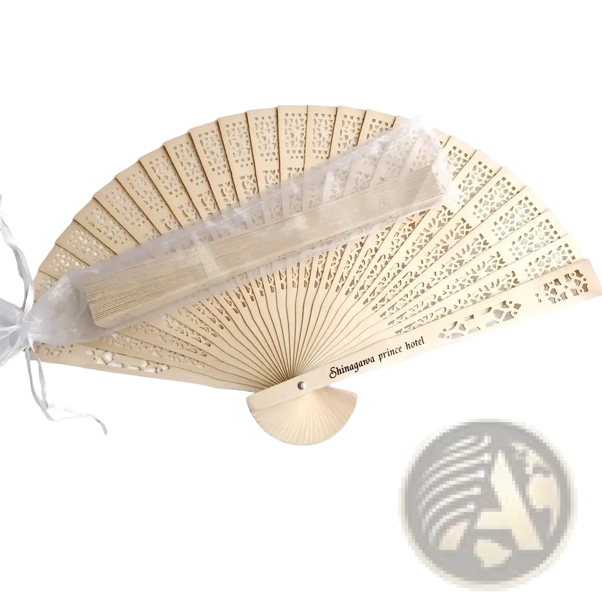 Custom engraved beige wooden wedding fan favor with intricate lace-like cutouts and shinagawa prince hotel engraving on handle
