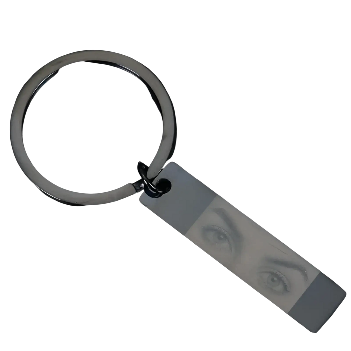 Black metal custom eye photo engraved stainless steel keychain with rectangular tag featuring engraved eyes portrait