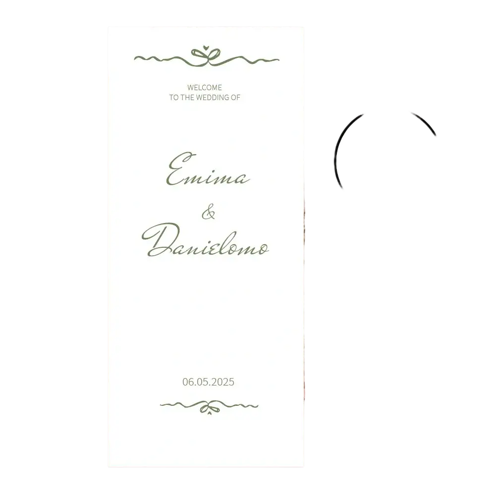 Custom fabric white wedding welcome sign with green cursive script and decorative flourishes featuring names and date with black ribbon detail