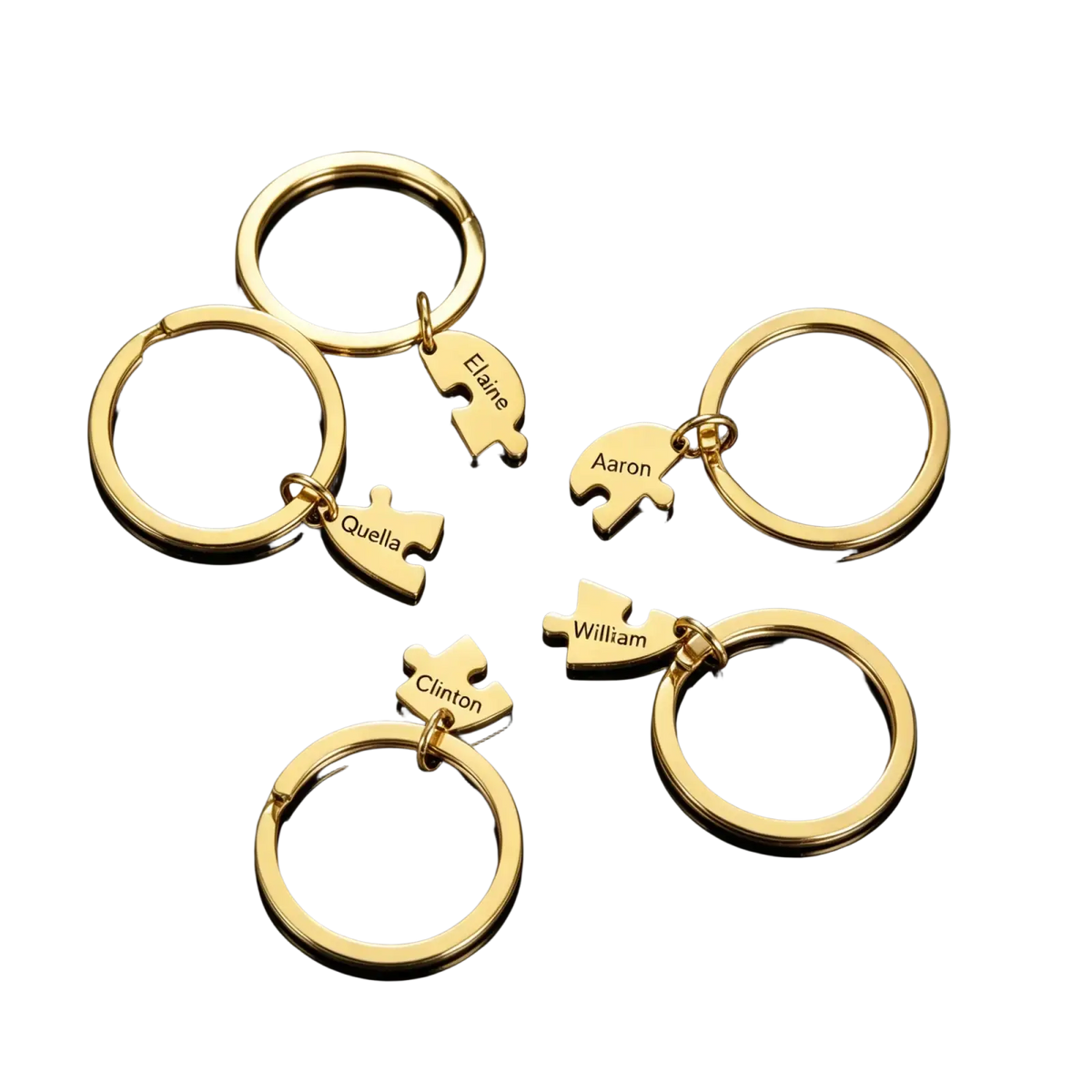 Gold-colored custom family puzzle heart keychains with engraved names made of metal for personalized gifts