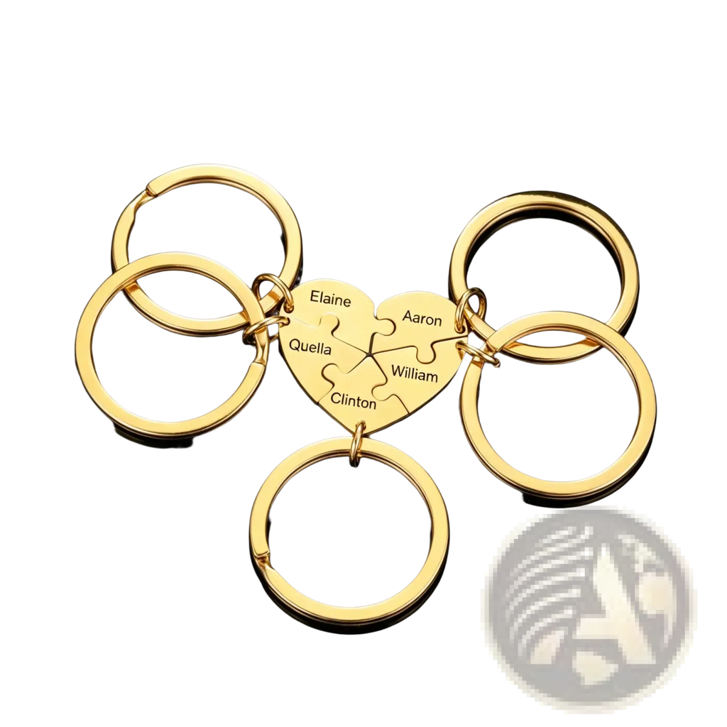 Custom family puzzle heart keychain in gold color featuring engraved names elaine aaron quella william and clinton