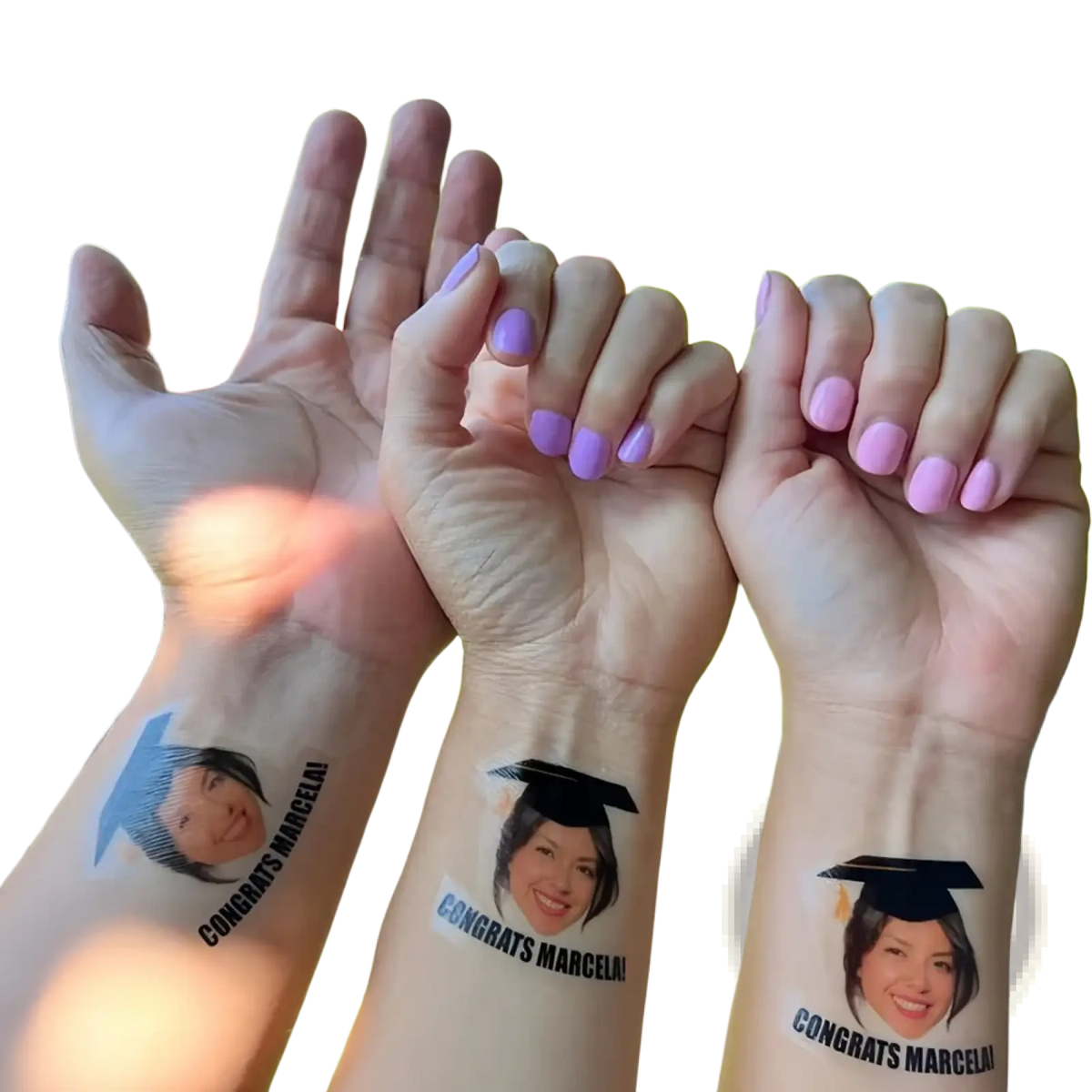 Custom graduation face tattoos featuring a smiling woman with a black mortarboard and congrats marcela text below