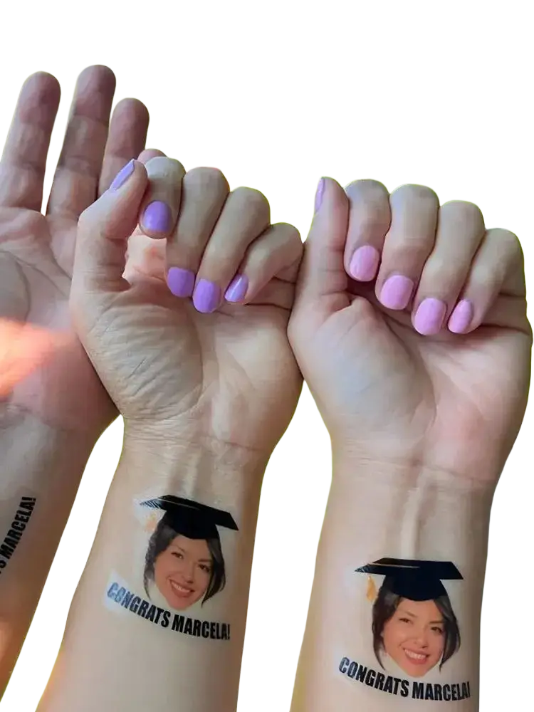 Custom graduation face tattoo featuring a smiling woman in a cap with congrats marcela printed below for party favors