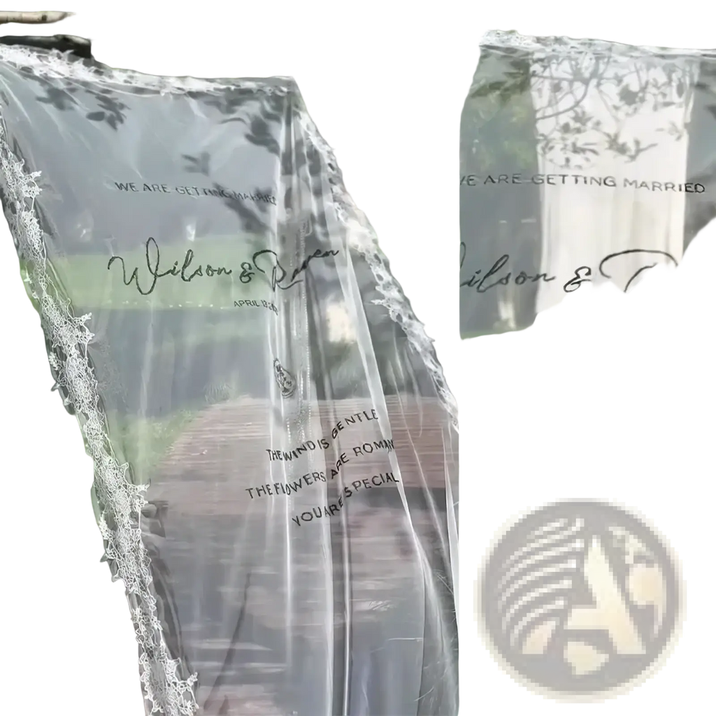 Custom lace wedding welcome sign banner clear sheer curtain with delicate lace trim and black cursive text hanging outdoors