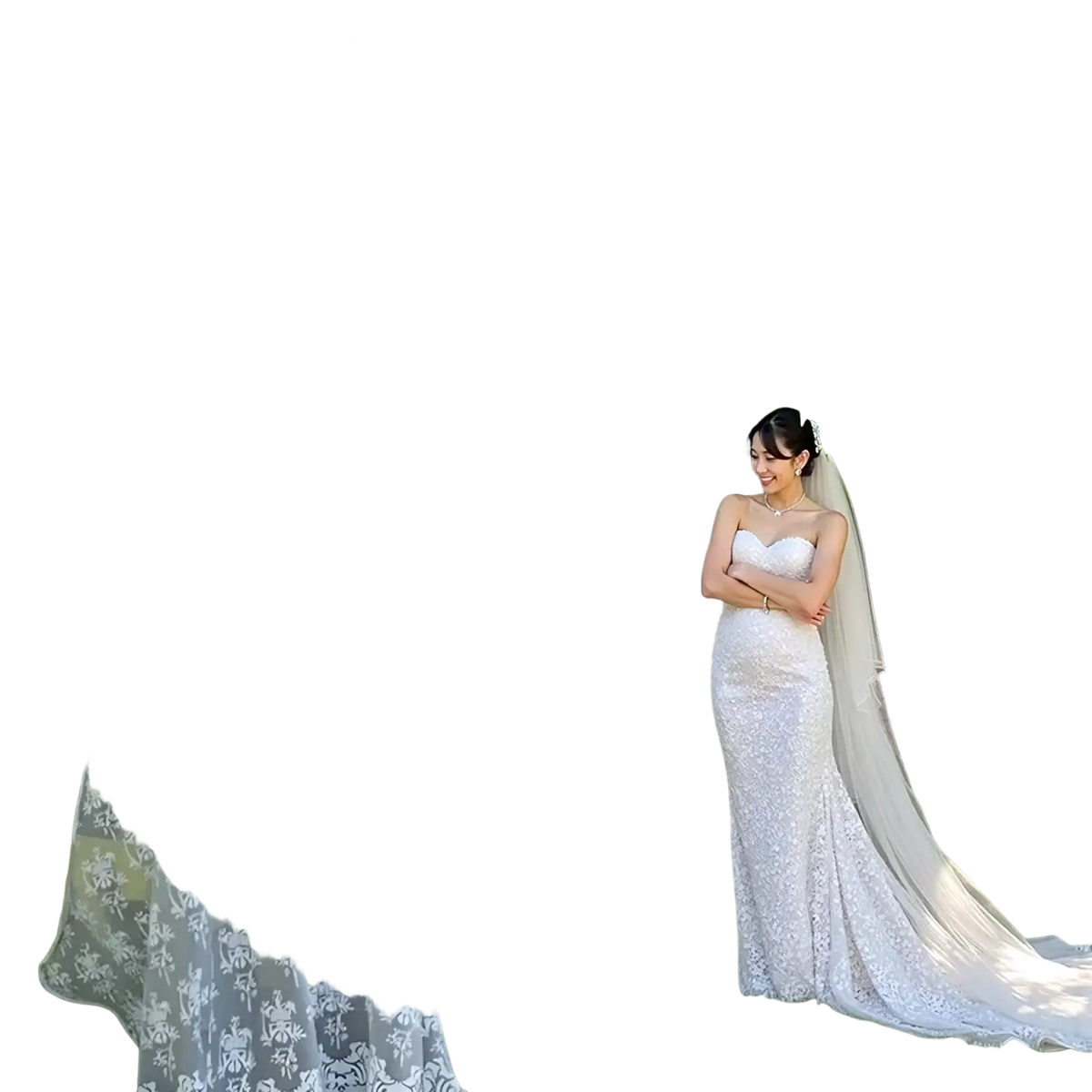 White lace wedding welcome sign banner featuring a fitted bodice and flowing train design for elegant events