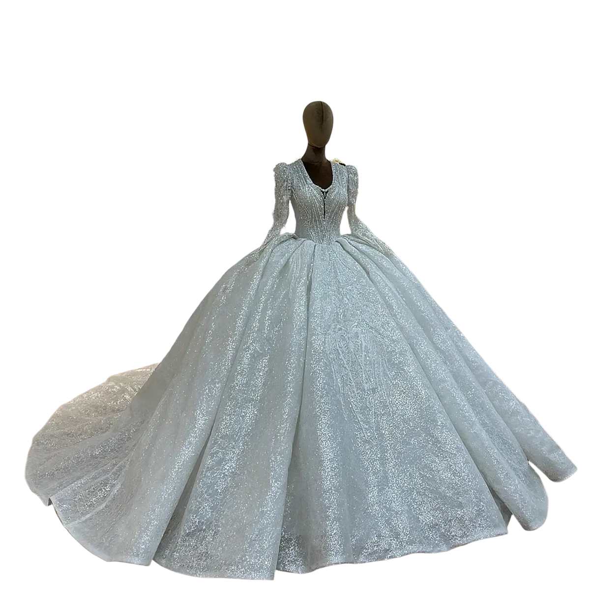 A custom long sleeve lace ball gown wedding dress in shimmering silver sequins with a voluminous skirt displayed on a mannequin