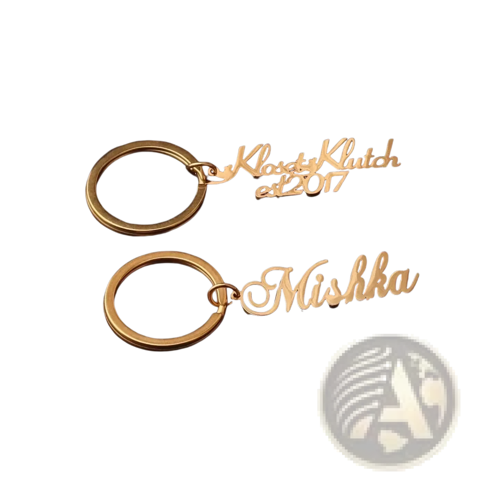 Gold-colored stainless steel custom name keychains engraved with kloset klutch est 2017 and mishka names gift