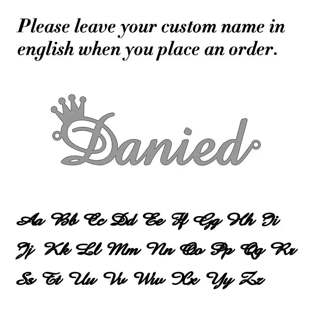 Silver crown-shaped stainless steel custom name keychain pendant with the name danied in cursive script