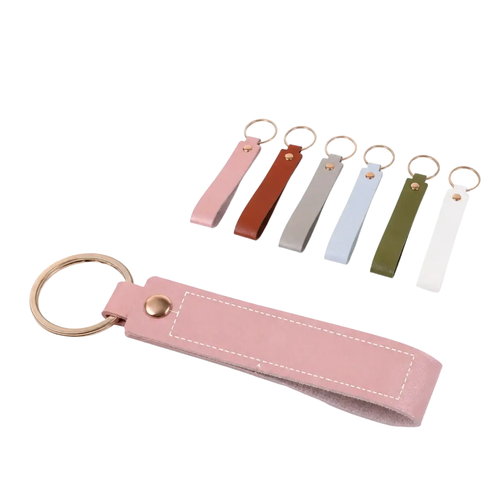 Custom name pink leather keychain with gold-toned metal ring and button closure for secure key storage