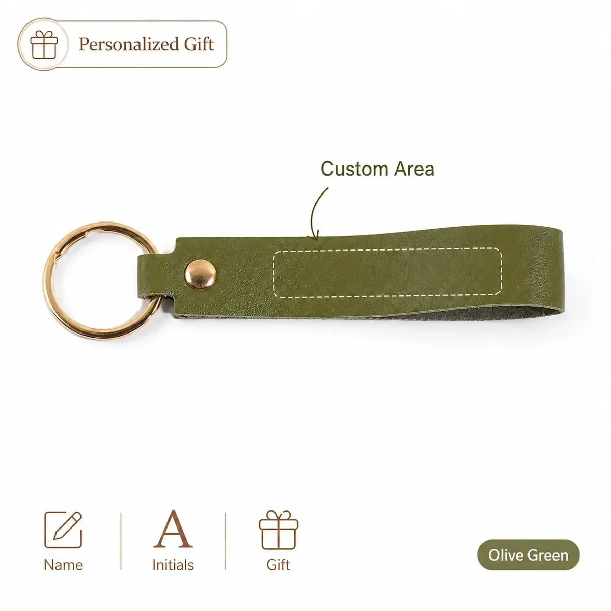 Custom name pink leather keychain featuring olive green leather key fob with gold metal ring and stitched engraving area