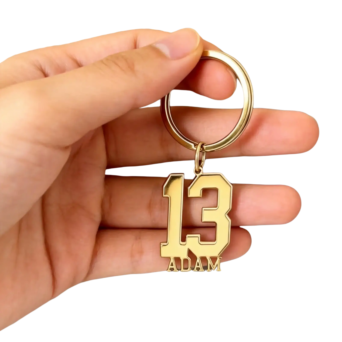 Gold-colored personalized custom number and name keychain featuring number 13 and name Adam in bold block font