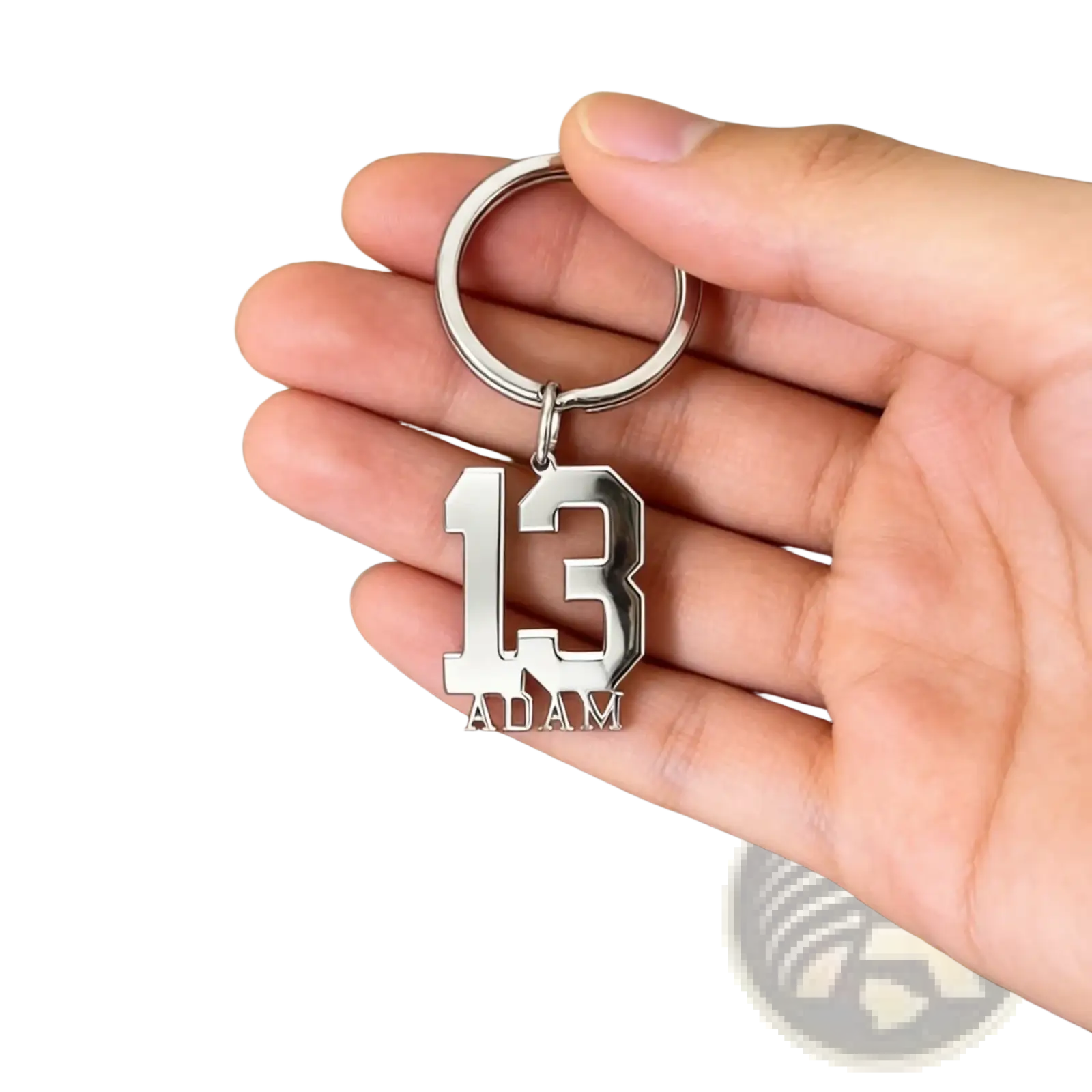 Silver metallic custom number and name keychain with bold 13 and adam in classic sports jersey font