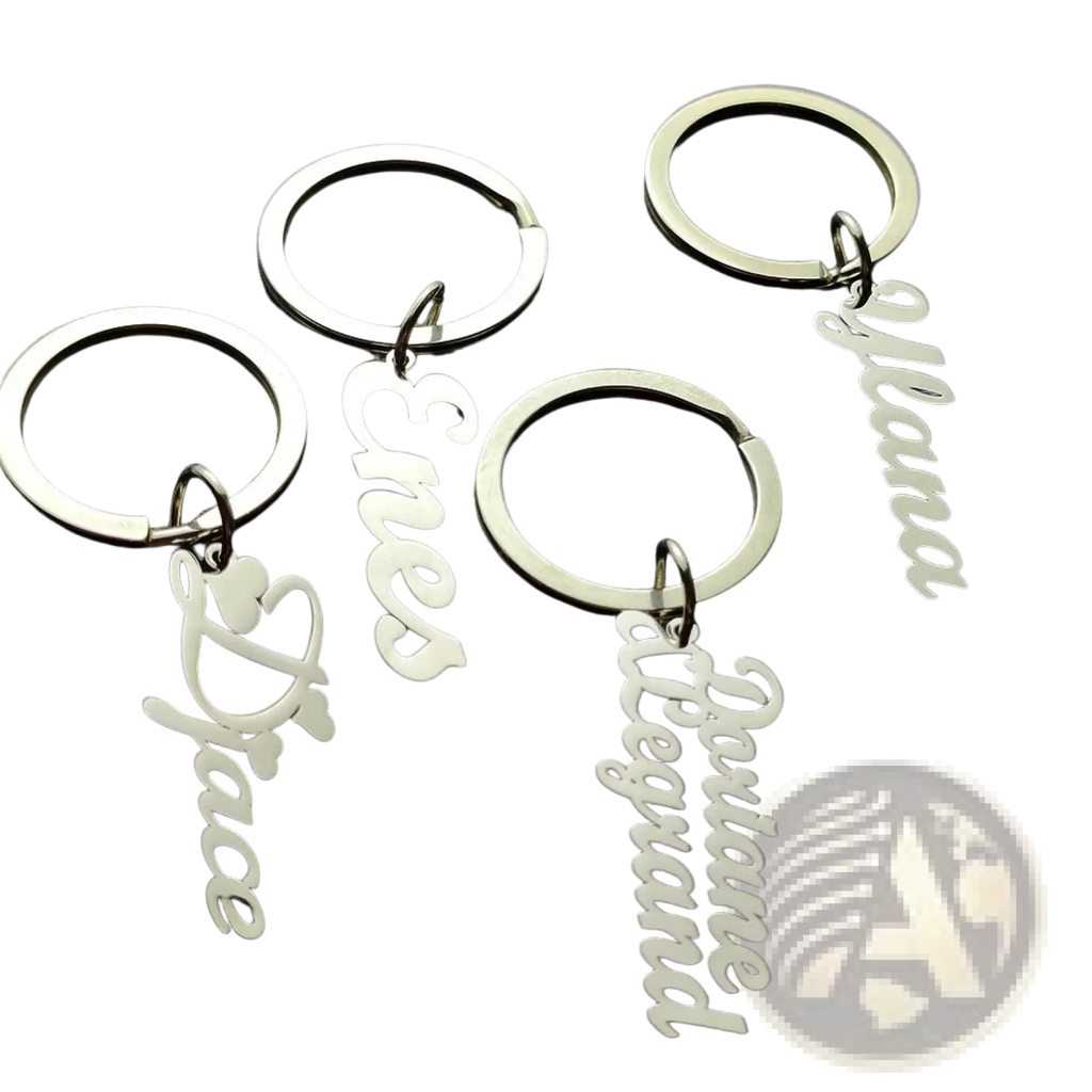 Silver metallic custom personalized name keychains in stainless steel with elegant cursive script design