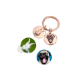 Rose gold custom personalized pet portrait keychain with two engraved circular charms featuring pet images