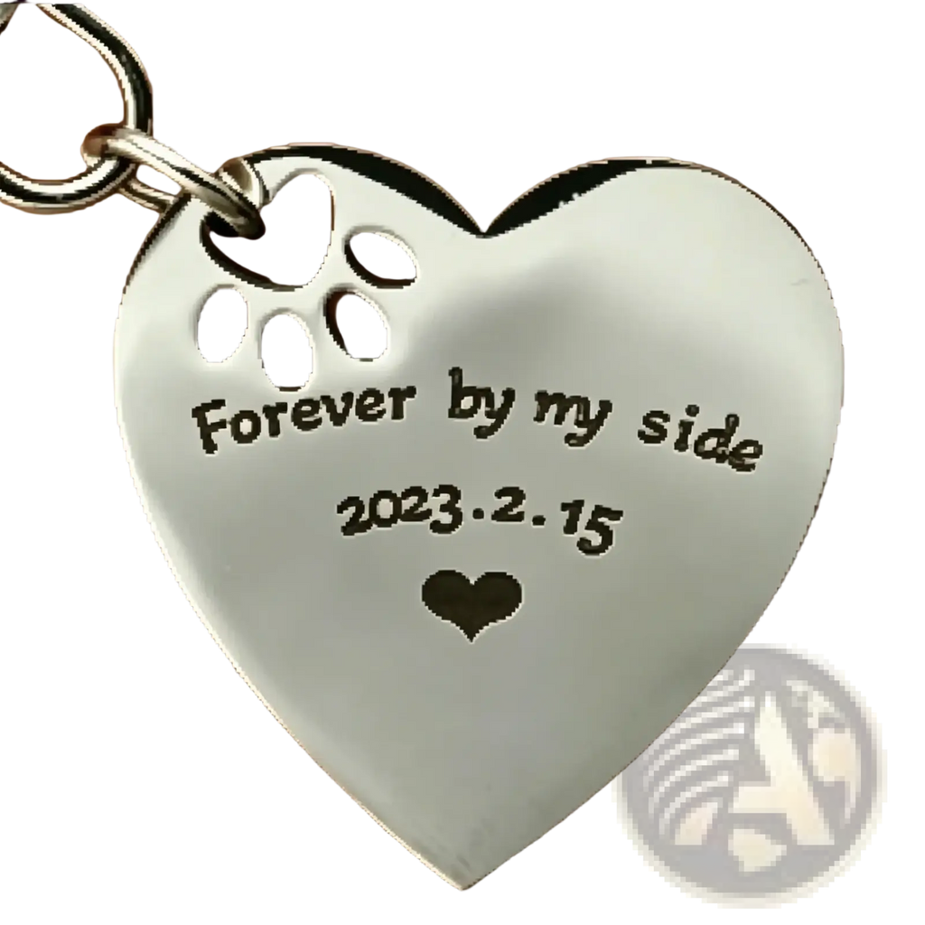 Silver stainless steel heart-shaped keychain with paw print cutout engraved forever by my side 2023.2.15 and small heart