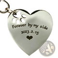 Silver stainless steel heart-shaped keychain with paw print cutout engraved forever by my side 2023.2.15 and small heart