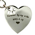 Silver stainless steel heart-shaped keychain with paw print cutout engraved forever by my side 2023.2.15 and small heart