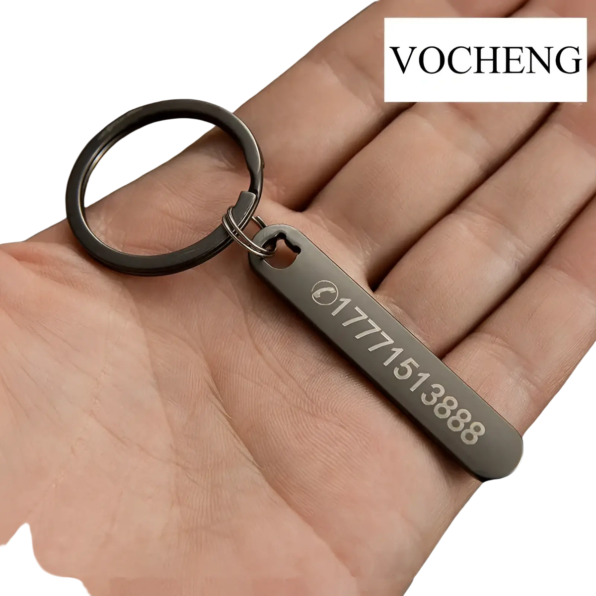 Black metal custom phone number keychain with rectangular tag laser engraved with 17771513888 and phone icon