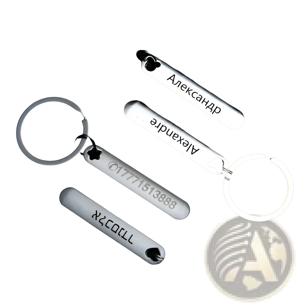 Silver rectangular metal keychains with laser engraved names phone numbers and heart shaped cutout end for custom use