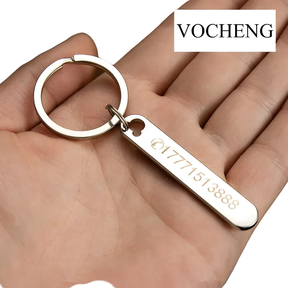 Silver rectangular custom phone number keychain laser engraved metal key ring with a small hole near the top
