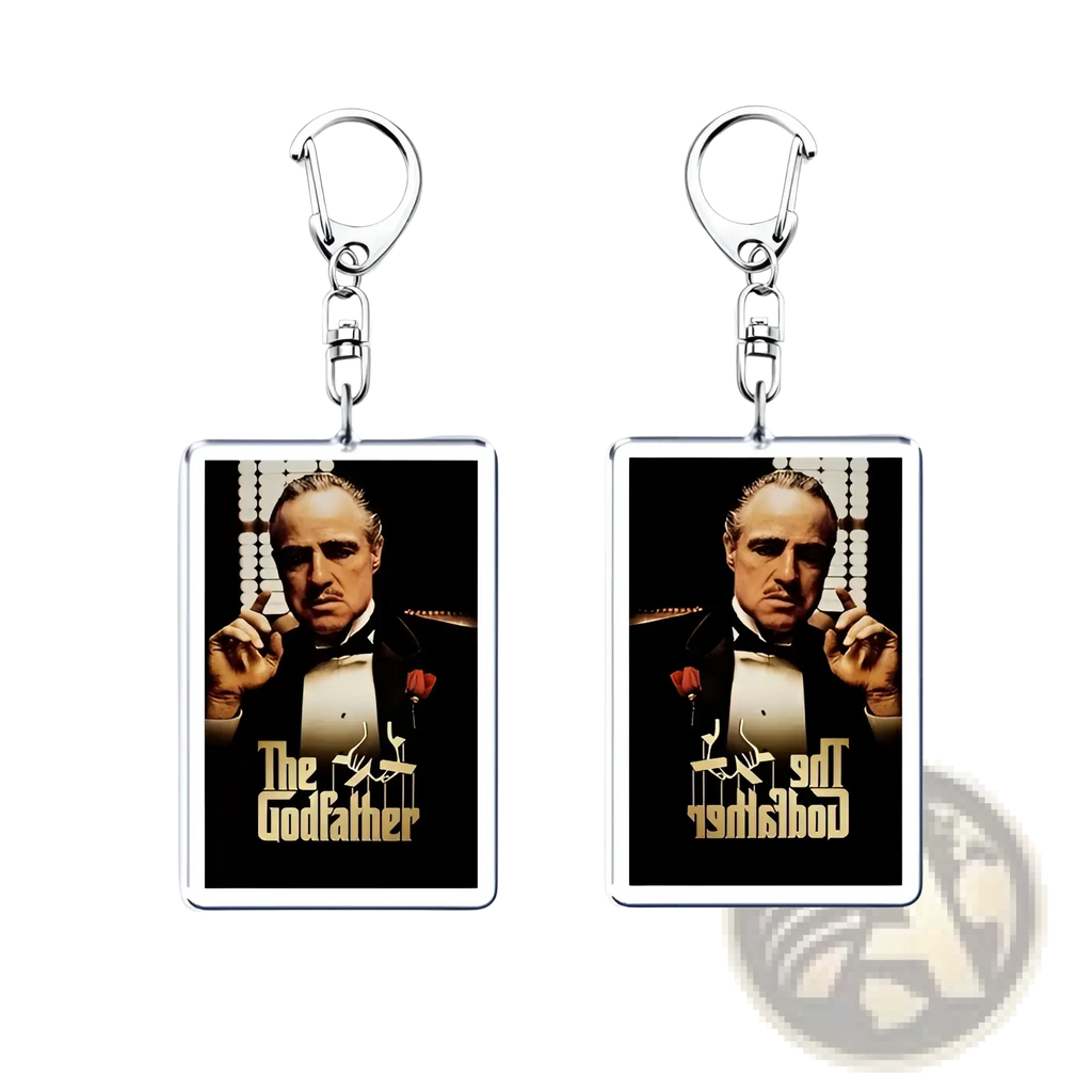 Rectangular acrylic keychain featuring the godfather movie poster with gold lettering on a black background